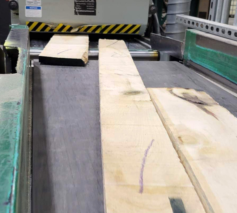 boards coming out of planer